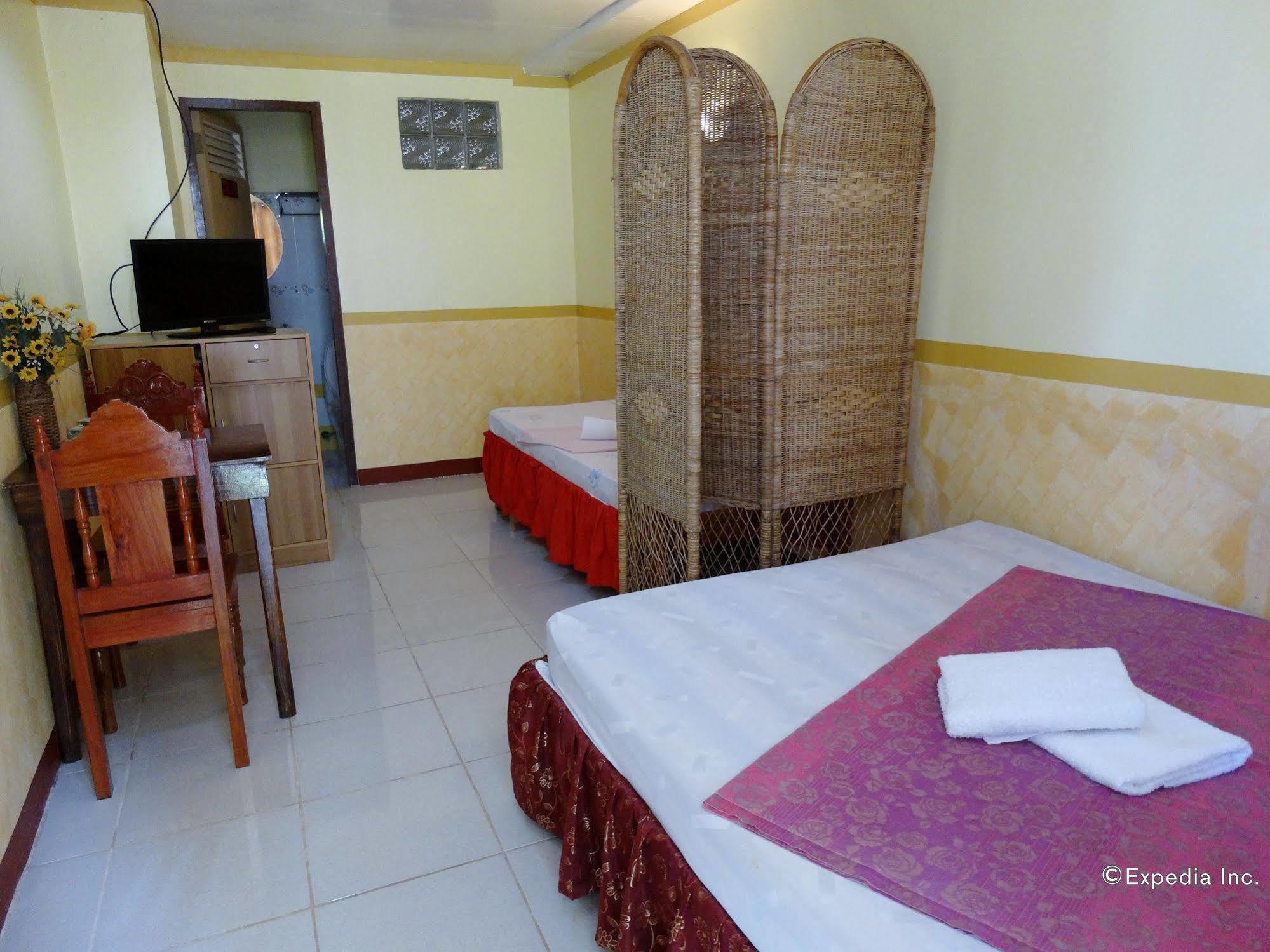 D'Lucky Garden Inn & Suites Tiniguiban Exterior photo